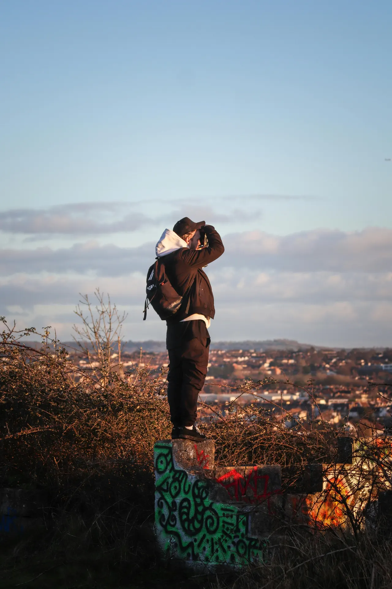 Traveller crossing a heathland trail during a premium safari route in England